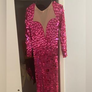 Formal dress from boutique amekano out of Texas. Dress is mesh material.